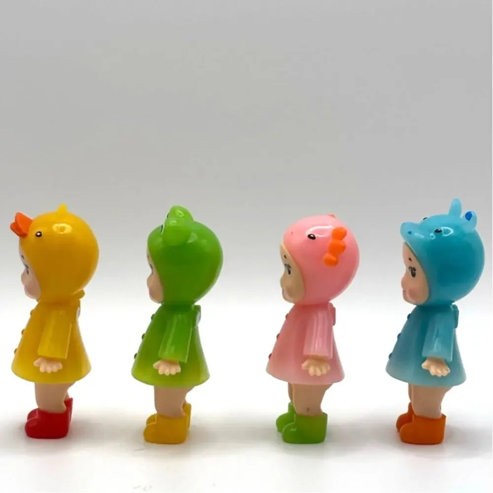 Set of 4 New Unbranded Kewpie/Angle Mini Figures, Rainy Day Costumes, Open Box